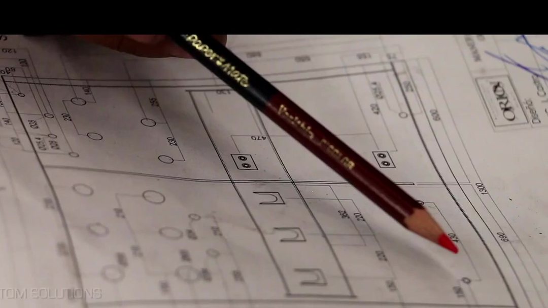 Transformer design drawing on the engineering desk at Transformadores Orión